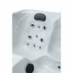 Spa jacuzzi de luxe avec plusieurs jets et appui-tête pour la détente.