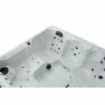 Jacuzzi de luxe avec jets de massage et éclairage pour la détente dans votre piscine.