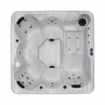 Jacuzzi de luxe avec jets de massage et éclairage pour la détente.