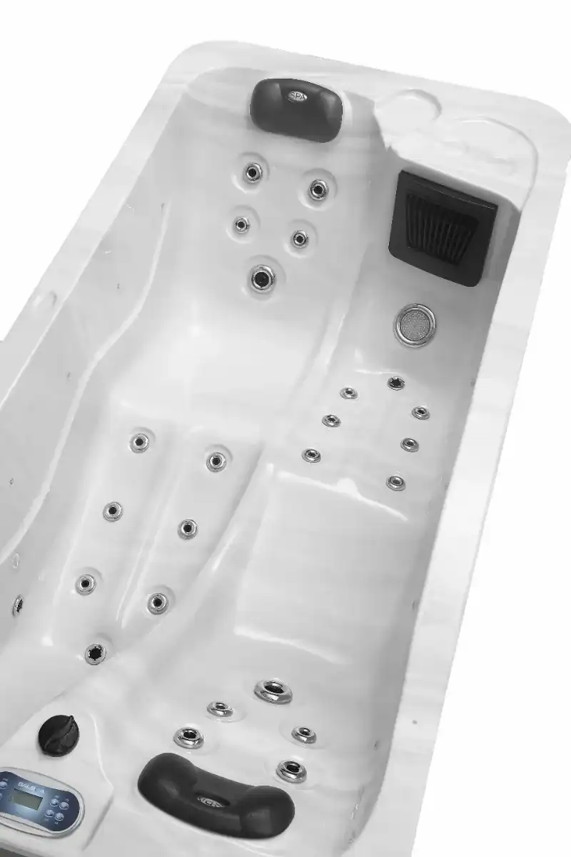 Spa de luxe 2 personnes avec jets de massage et éclairage LED.