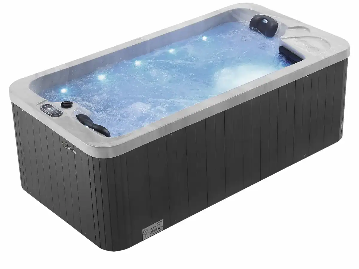 Spa de luxe 2 personnes avec fonctions jacuzzi et éclairage LED.