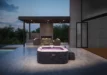 Jacuzzi extérieur de luxe sur terrasse avec fauteuils lounge confortables et cheminée extérieure.