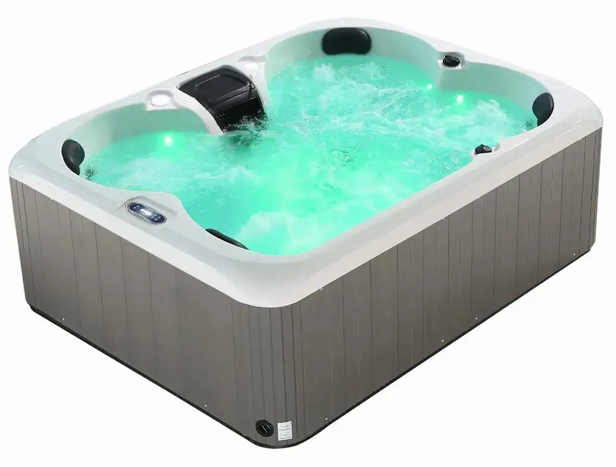 Spa de luxe pour 4 personnes avec éclairage et jets de massage pour la détente.