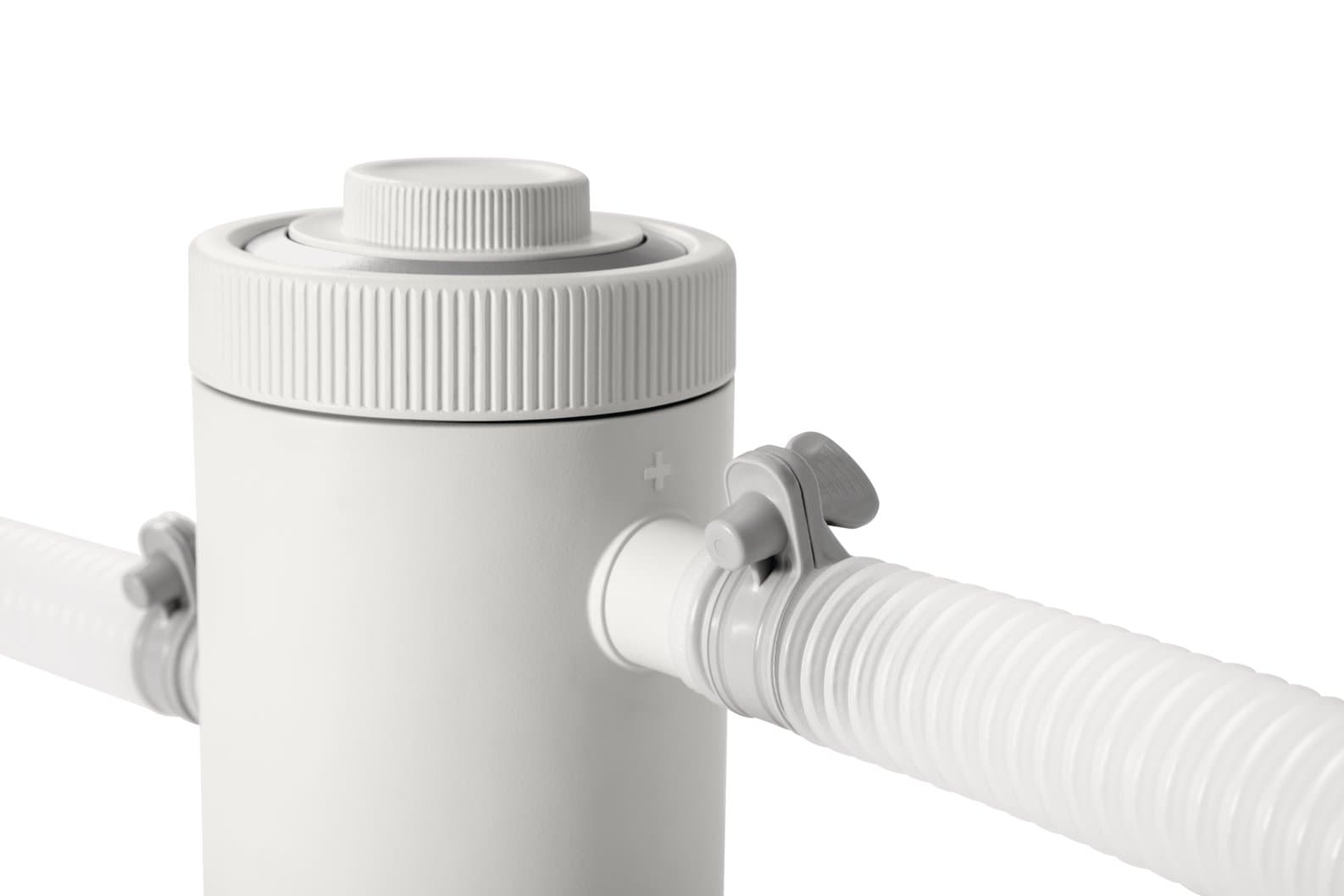 Pompe filtrante Intex C330 pour piscines, 1250 litres par heure, facile à installer et sans entretien.