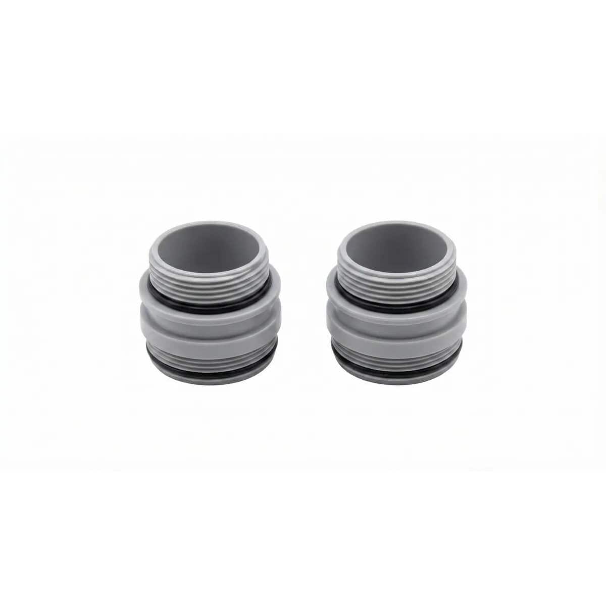 Deux raccords de piscine gris avec joints noirs pour une connexion étanche.