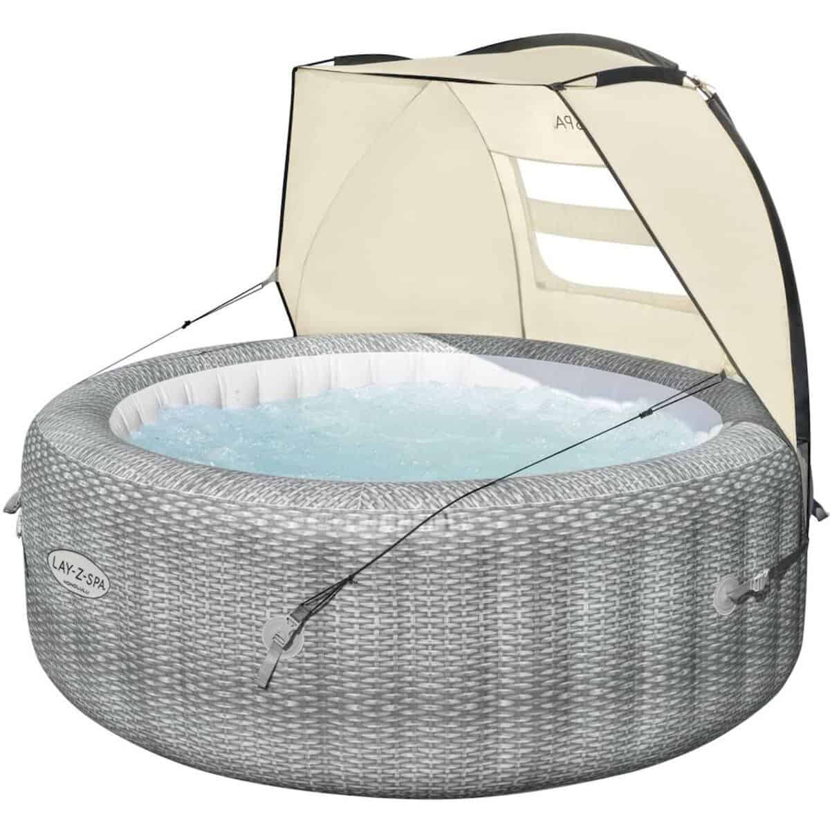 Spa de nage avec abri pour détente et confort.