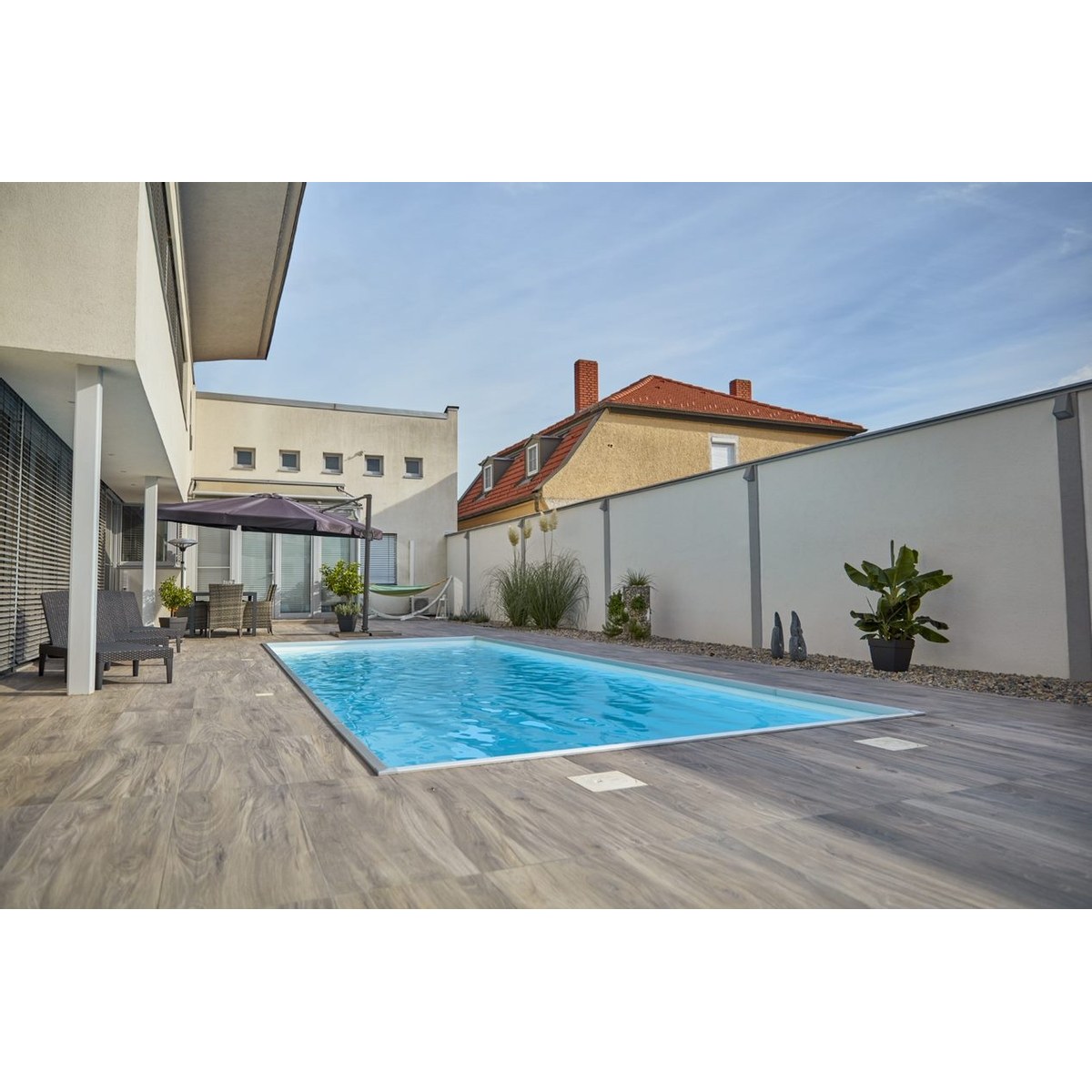 Piscine en polypropylène avec escalier d'angle - 4,50 x 3,10 x 1,50 m